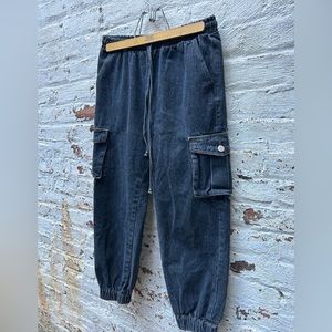 Women’s small Black Denim Cargo Pants with Elastic waistband.